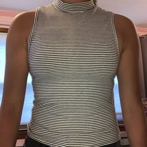 A black and white turtleneck